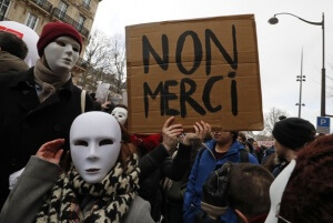 French sudents and labour union workers attend a demonstration against the French labour law proposal in Paris, France, as part of a nationwide labor reform protest, March 9, 2016. The slogan reads "No thanks". REUTERS/Philippe Wojazer - Credit: Slate