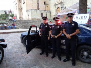 Federal police attempt public relations effort at a street fair in Oaxaca City. August 2015. Credit: Eric Larson.