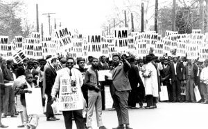 Striking members of Memphis Local 1733 hold signs whose slogan symbolized the sanitation workers' campaign in 1968. 1968. Source: Walter Reuther Library.